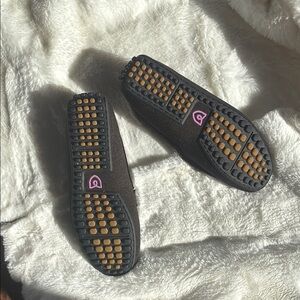 Rothy's Black Flats with Tan Nubs